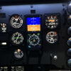 MFD King Air C90 analog instrument panel with backlit gauges